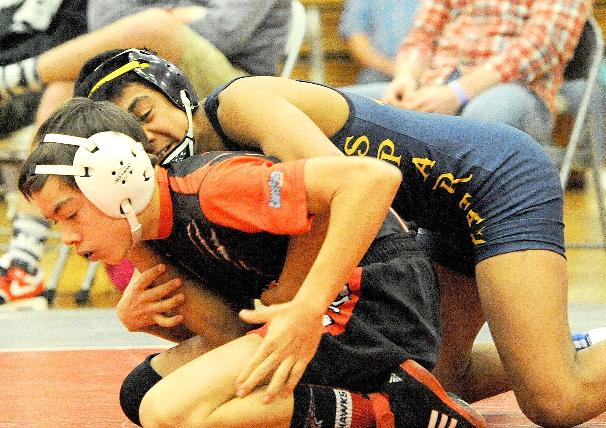 Lonnie Archibald/for Peninsula Daily News                                Forks’ Josue Lucas, right, came in first in the 106-pound division at regionals with three straight pins.
