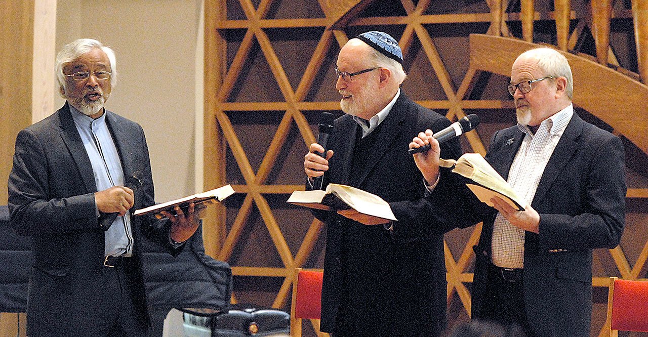 The Pacific Northwest Interfaith Amigos, from left, Imam Jamal Rahman, Rabbi Ted Falcon and Pastor Dave Brown, speak about the similarities of their respective religions during a presentation on Saturday at Holy Trinity Lutheran Church in Port Angeles. (Keith Thorpe/Peninsula Daily News)