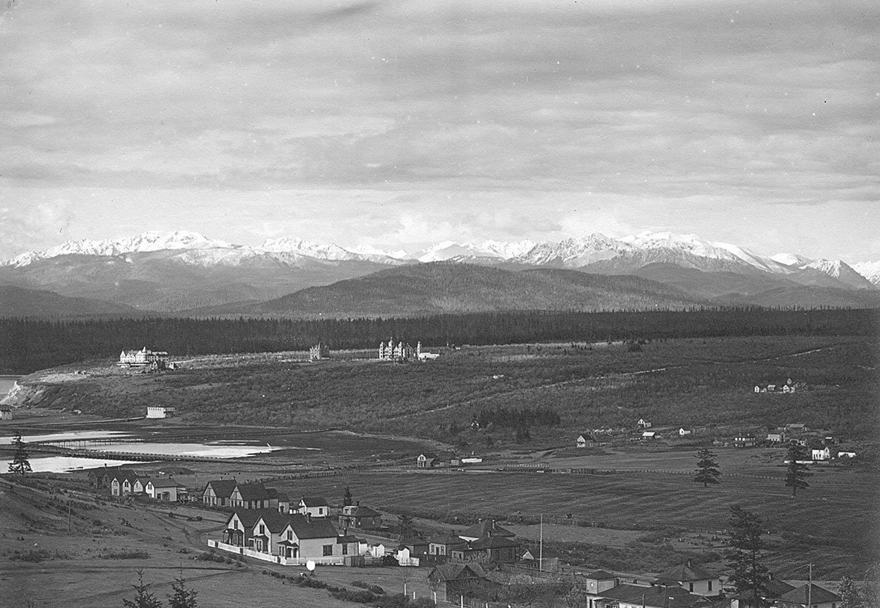 Jefferson County Historical Society                                The view toward the mountains in 1902 shows the Eisenbeis Hotel, Eisenbeis residence and, in the center, St. John’s Hospital at 651 Cleveland St. in Port Townsend.