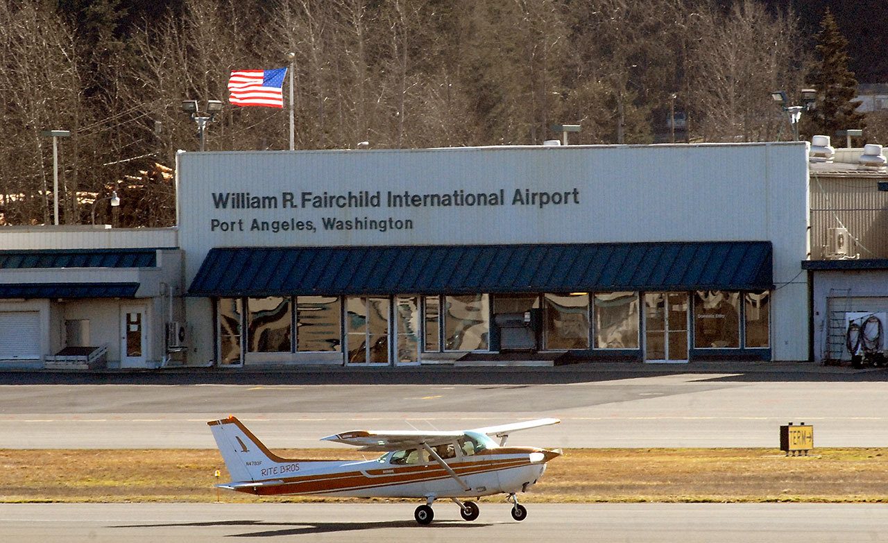A Cessna 172 belonging to Rite Bros. Aviation lands at William R. Fairchild International Airport in Port Angeles on Tuesday. (Keith Thorpe/Peninsula Daily News)