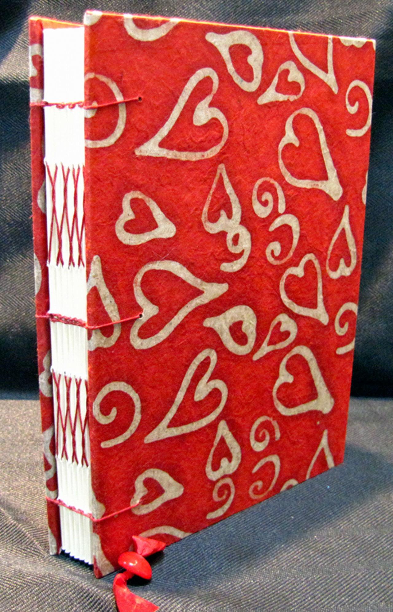 Handmade red hearts journal by Jean Wyatt.