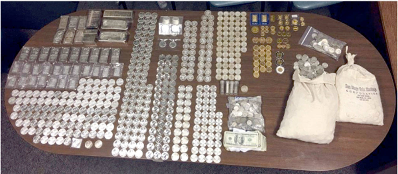 A collection of gold and silver valued at $115,000 was found in Everett after it was stolen from a home in Jefferson County. (Marysville Police Department)
