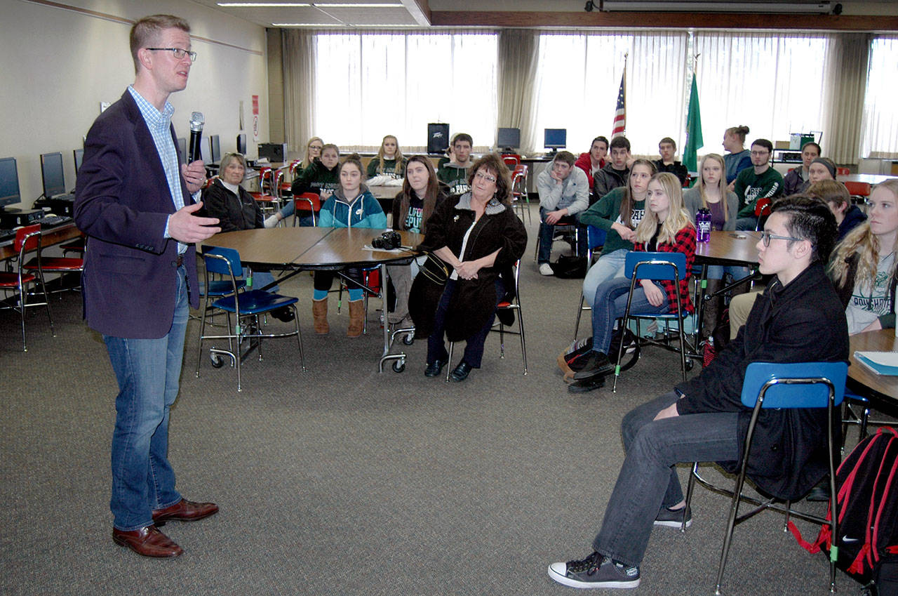 U.S. Rep. Derek Kilmer urges a library full of Port Angeles High School students Monday to get involved in contemporary issues if that’s their passion. (Paul Gottlieb/Peninsula Daily News)