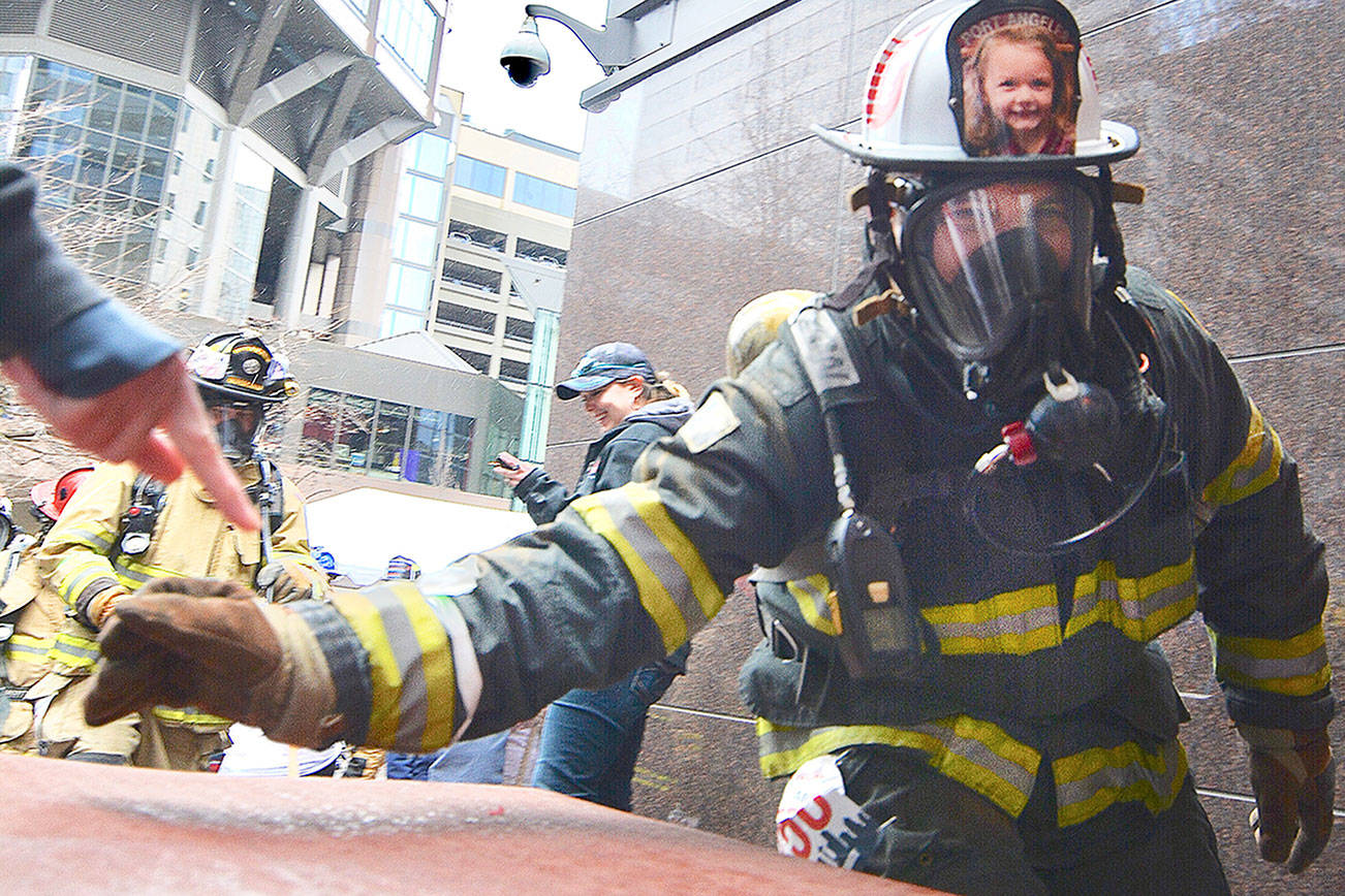 Peninsula firefighters tackle Columbia Center for cause