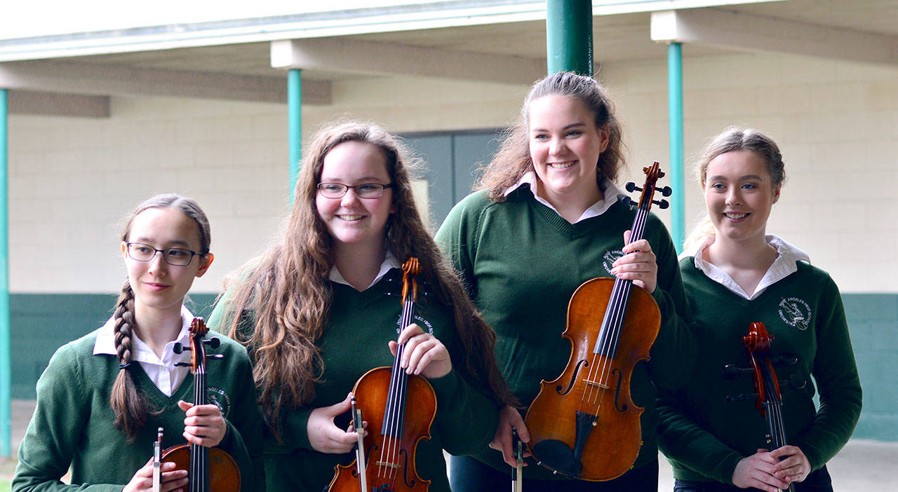 Port Angeles High School chamber musicians to play at the March 25 Applause! Auction and Dinner are, from left, Hana Kildall, 18; Marley Cochran and Lauren Waldron, both 17; and Lauren Paup-Byrnes, 16.