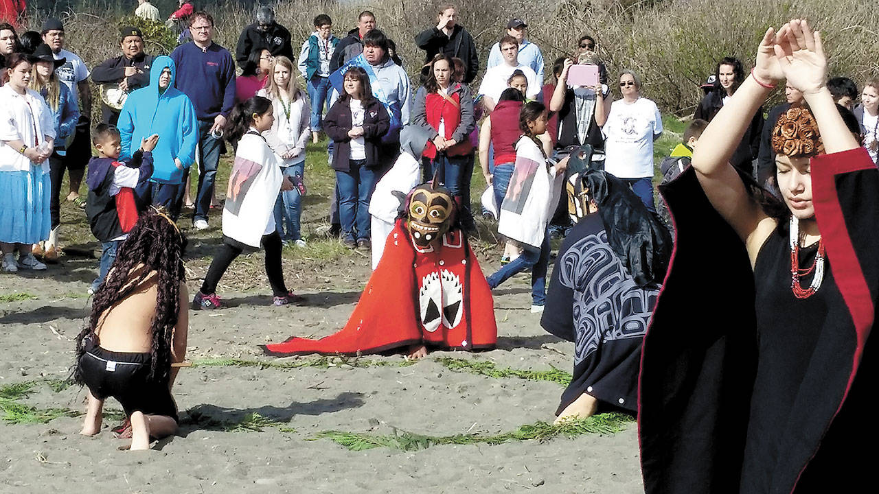 Children dance during the Quileute tribe’s whale song during the ninth annual Welcoming of the Whales ceremony near First Beach in La Push in 2016. Several gray whales appeared just offshore “flipping their tales” and spouting during the ceremony, delighting a crowd of onlookers. (Michael Foster/Peninsula Daily News)