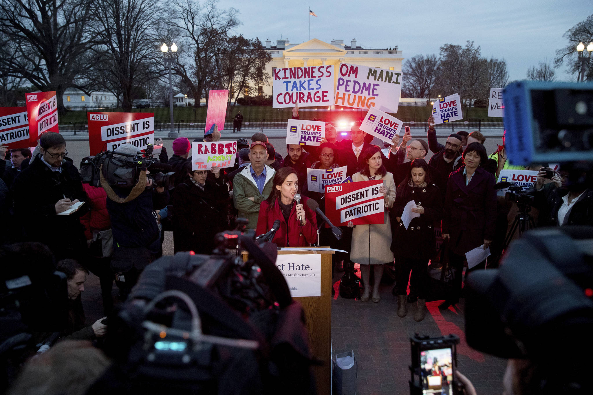 People gather for a protest against President Donald Trump’s new travel ban order in Lafayette Park outside the White House on Monday in Washington, D.C. (Andrew Harnik/The Associated Press)