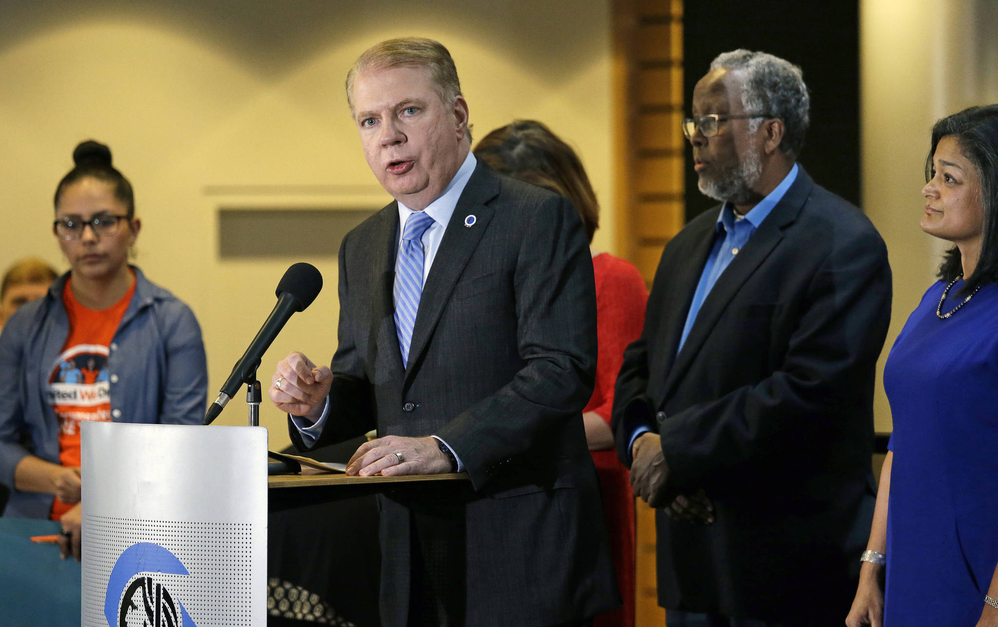 In this Nov. 9, 2016, photo, Seattle Mayor Ed Murray, second from left, speaks at a post-election event of elected officials and community leaders at City Hall in Seattle. (Elaine Thompson/The Associated Press)