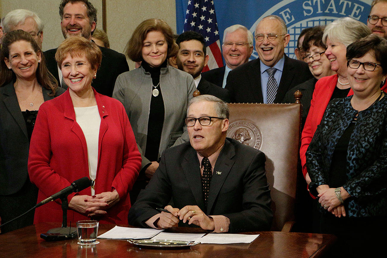 Inslee signs bill ensuring schools’ 28 percent levy-lid secure until 2019 expiration