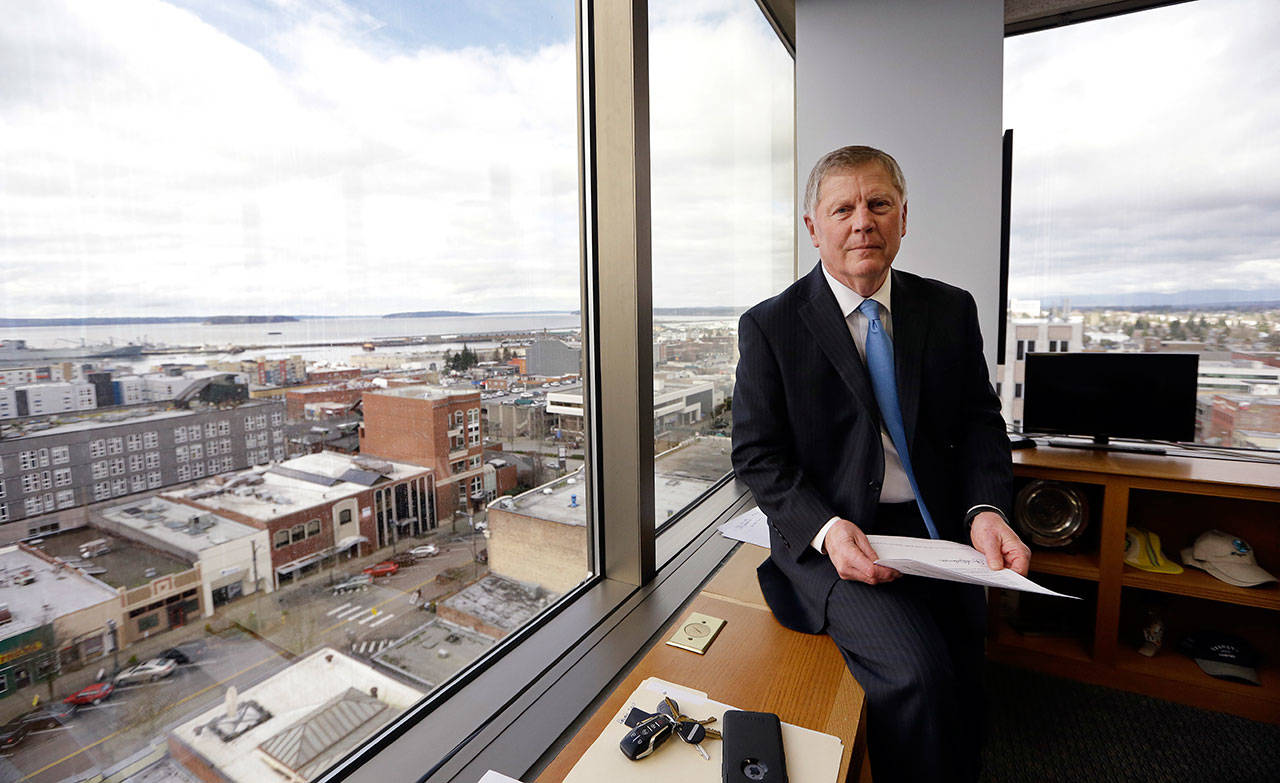 Everett Mayor Ray Stephanson sits in his corner office overlooking the city’s downtown last month. (Elaine Thompson/The Associated Press)