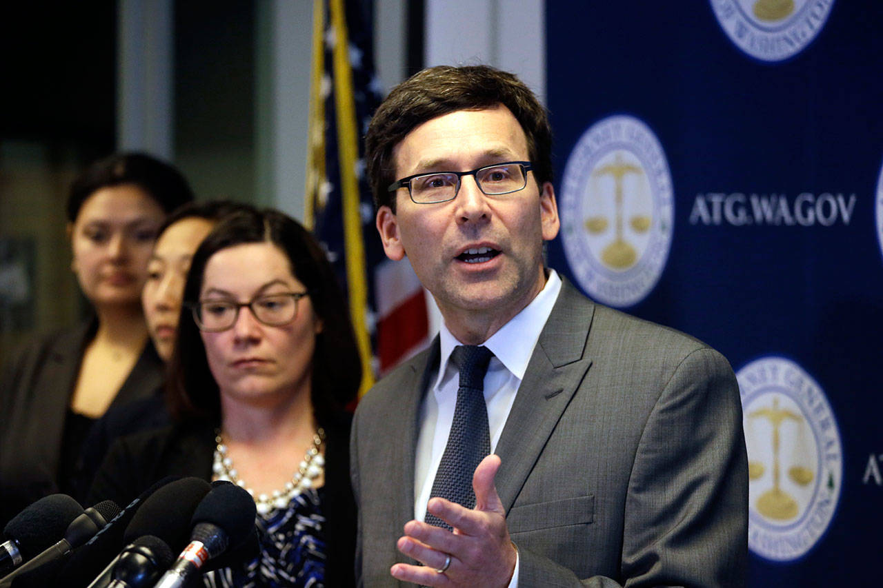 Washington state Attorney General Bob Ferguson speaks Thursday in Seattle at a news conference about the state’s response to President Donald Trump’s revised travel ban. (Elaine Thompson/The Associated Press)