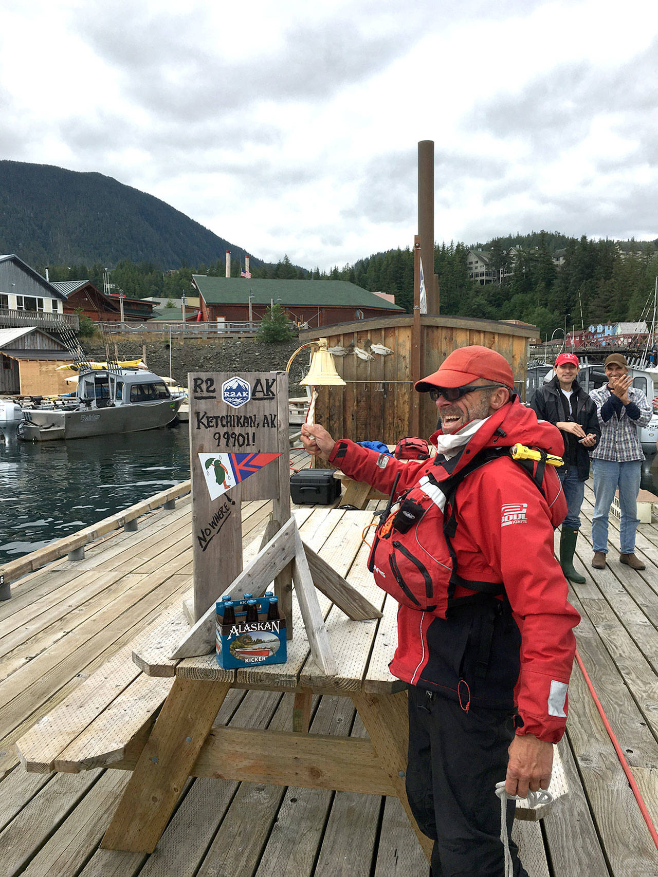 Thomas Nielsen of Team Sea Runners rings the finish bell in Ketchikan, Alaska, after completing the voyage from Port Townsend in 2016. (Race to Alaska)