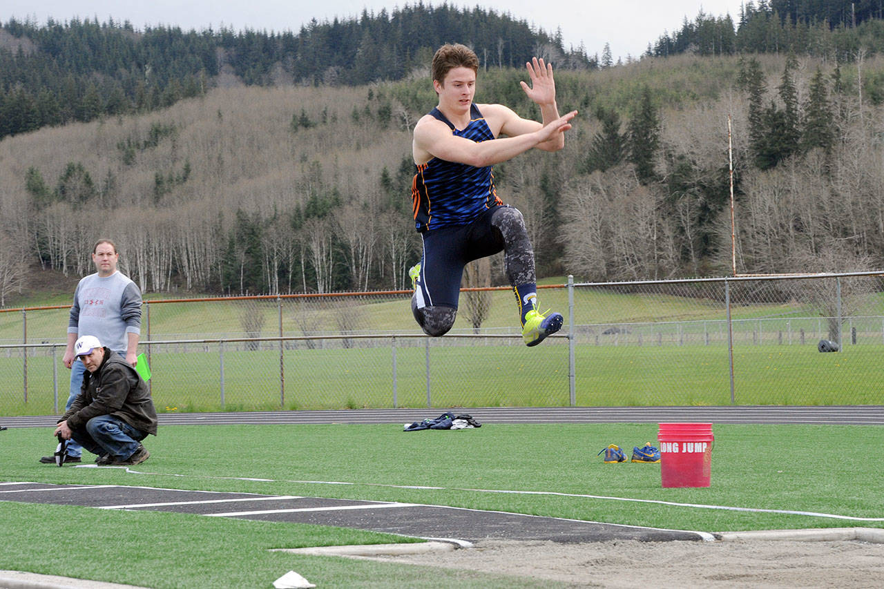 Lonnie Archibald/for Peninsula Daily News Cole Baysinger of Forks won the triple jump as well as three other individual events at the Forks Lions Club Invitational.