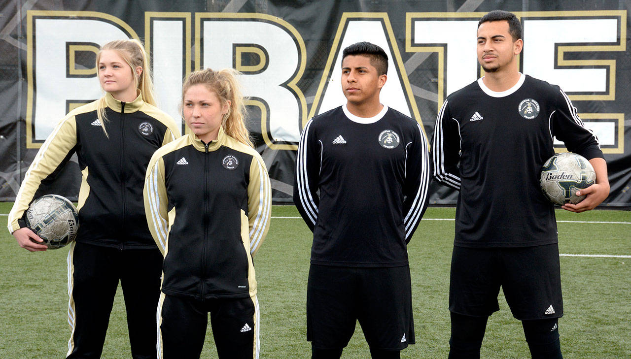 Peninsula College team captains for Saturday’s Rumble in the Rainforest soccer exhibition are from left, Bailie Zuber, Ellie Small, Salvador Vargas and Jason Ramos. The Pirate men and women will play two hour-long games during the spring soccer celebration at Wally Sigmar Field.