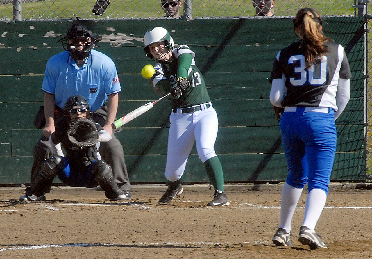 Keith Thorpe/Peninsula Daily News Port Angeles’ Nikaila Price connects on one of three Roughriders’ home runs in a 10-0 win over Olympic.