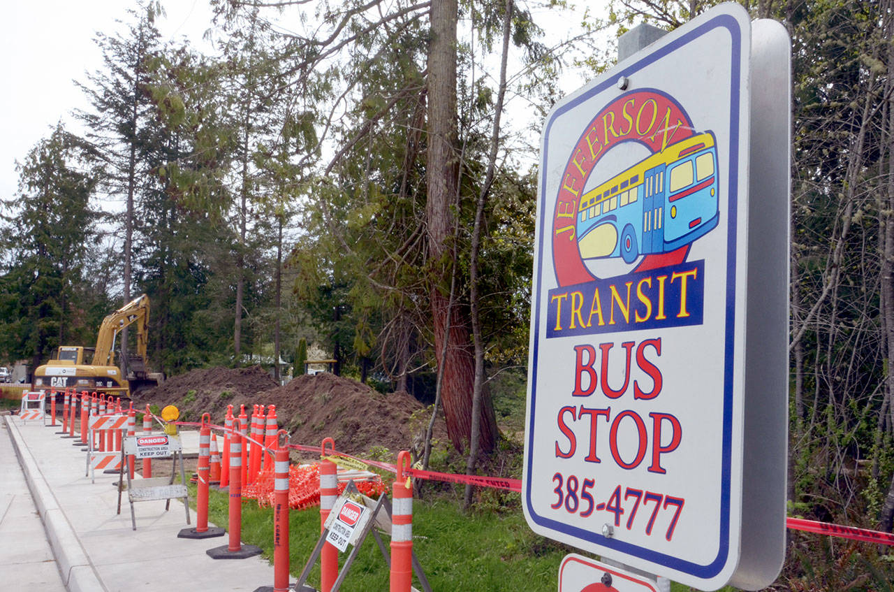 Jefferson County Transit broke ground Tuesday on a project that will expand its popular Four Corners Park and Ride to accommodate more commuters on bikes and in cars. (Cydney McFarland/Peninsula Daily News)