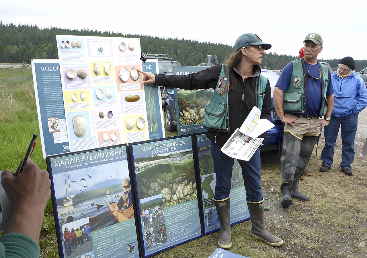 Jefferson Marine Resources Committee                                 State Department of Fish and Wildlife biologist Camille Speck explains types of clams to attendees of the 2016 Digging for Dinner shellfish harvesting clinic in Jefferson County.