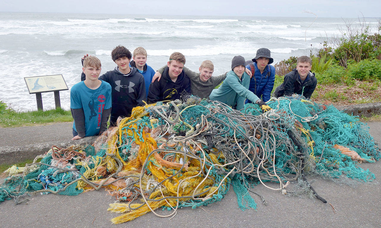 Members of Boy Scout Troop 1498 of Sequim removed this tangle of rope and net from the beach near Kalaloch Campground during the Washingon Coast Cleanup in 2016. From left are Devin Rynearson, Pascual Starcivich, Zay Jones, Ozzy Krammer,Ben Wright, Douglass Peecher, Alec Shingelton and Mathew Craig. (Peter Craig)