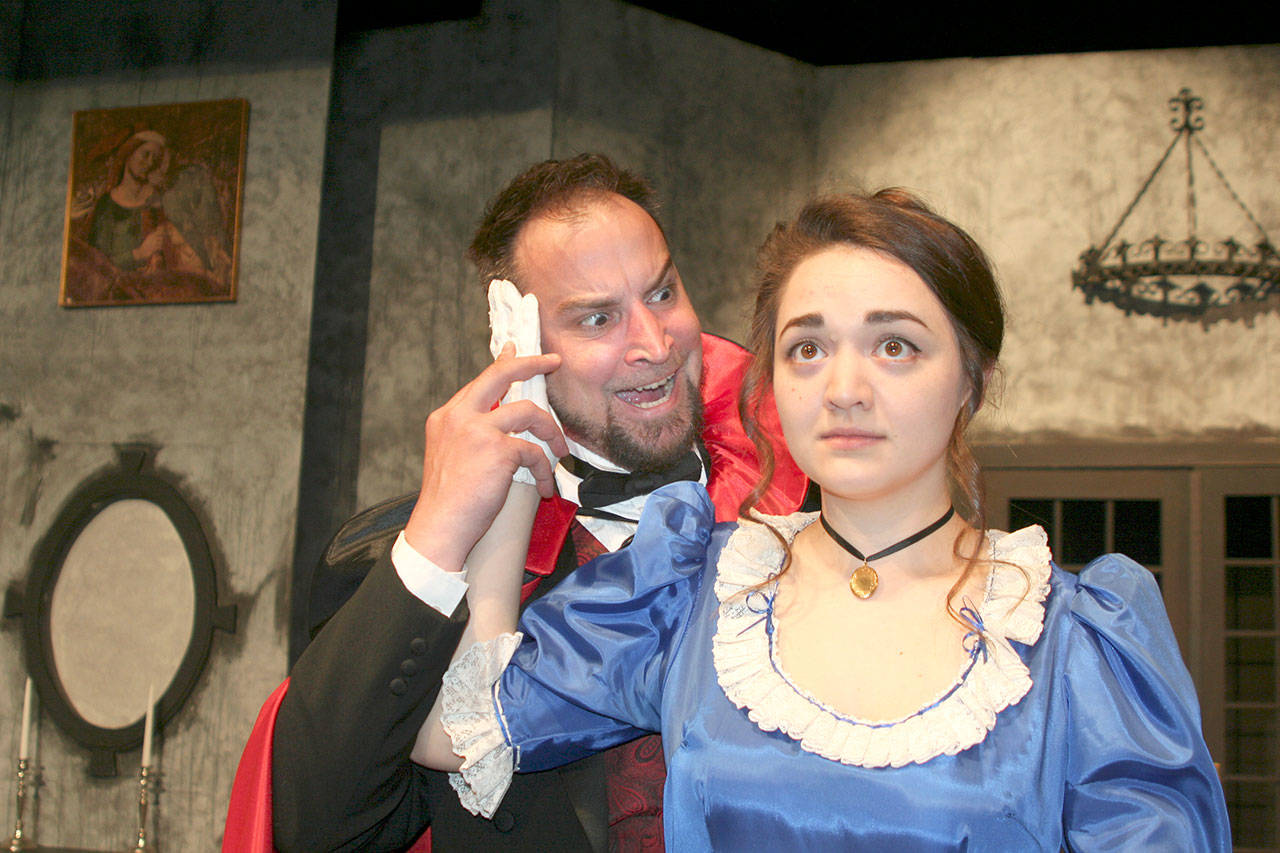 Jeremy Pederson as County Dracula and Luciana Barrera as Mina Seward reherse for “Dracula: The Musical?” (Kate Carter)