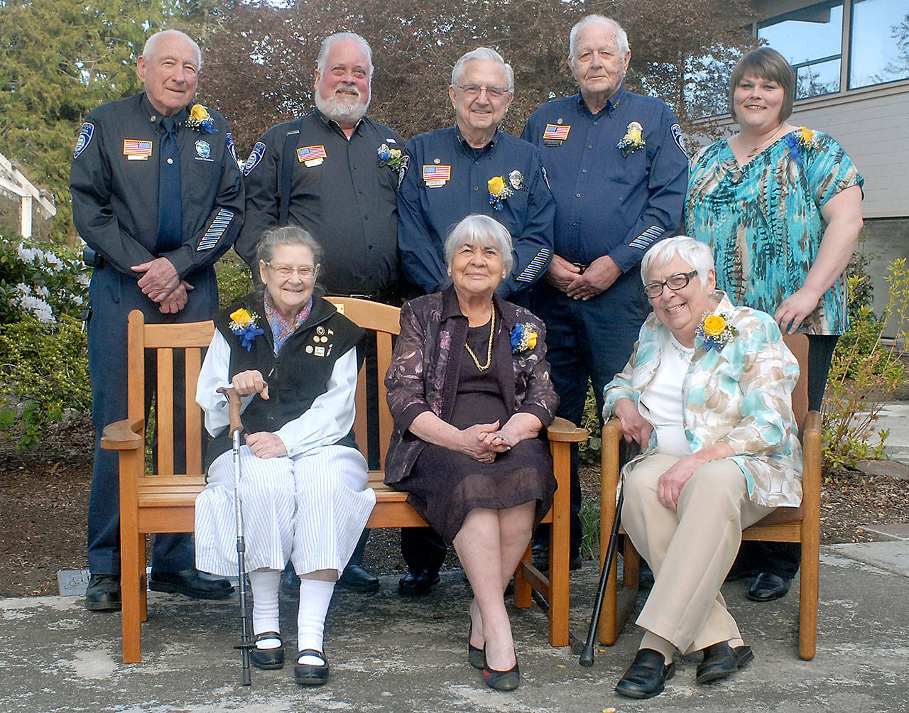 Clallam County Community Service Award winners gather prior to receiving their awards Thursday at Holy Trinity Lutheran Church in Port Angeles. Receiving awards were, front row from left, Jo Oliver, Dianna Cross and Mary Sherwood; and back row from left, Charles Devoney, Jim Walsh, Gary Marler, Bob Agee and Tammy Sullenger. (Keith Thorpe/Peninsula Daily News)