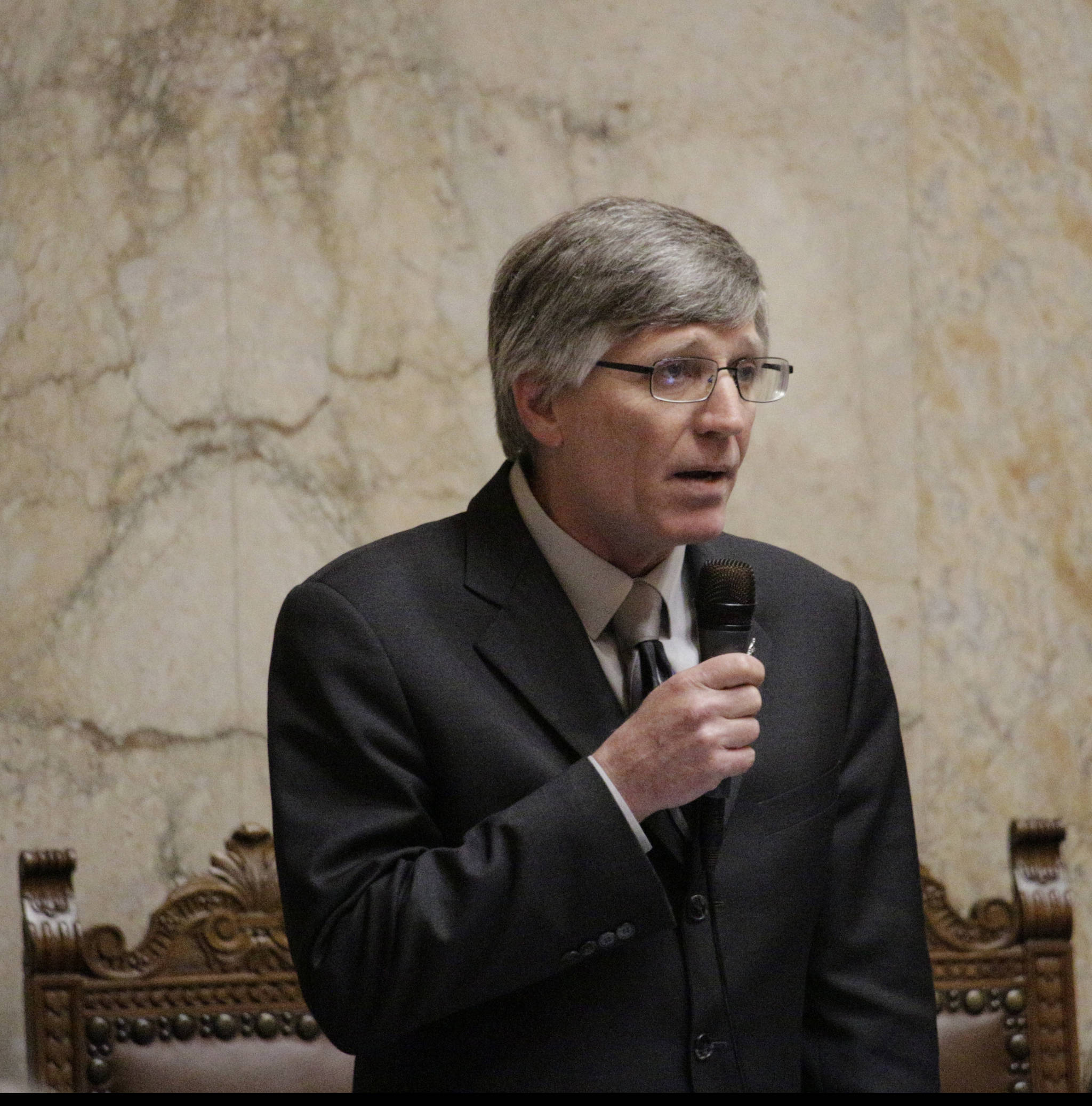 Democratic Rep. Timm Ormsby speaks on the House floor in support of a $44.9 billion two-year state budget proposal Friday in Olympia. (Rachel La Corte/The Associated Press)