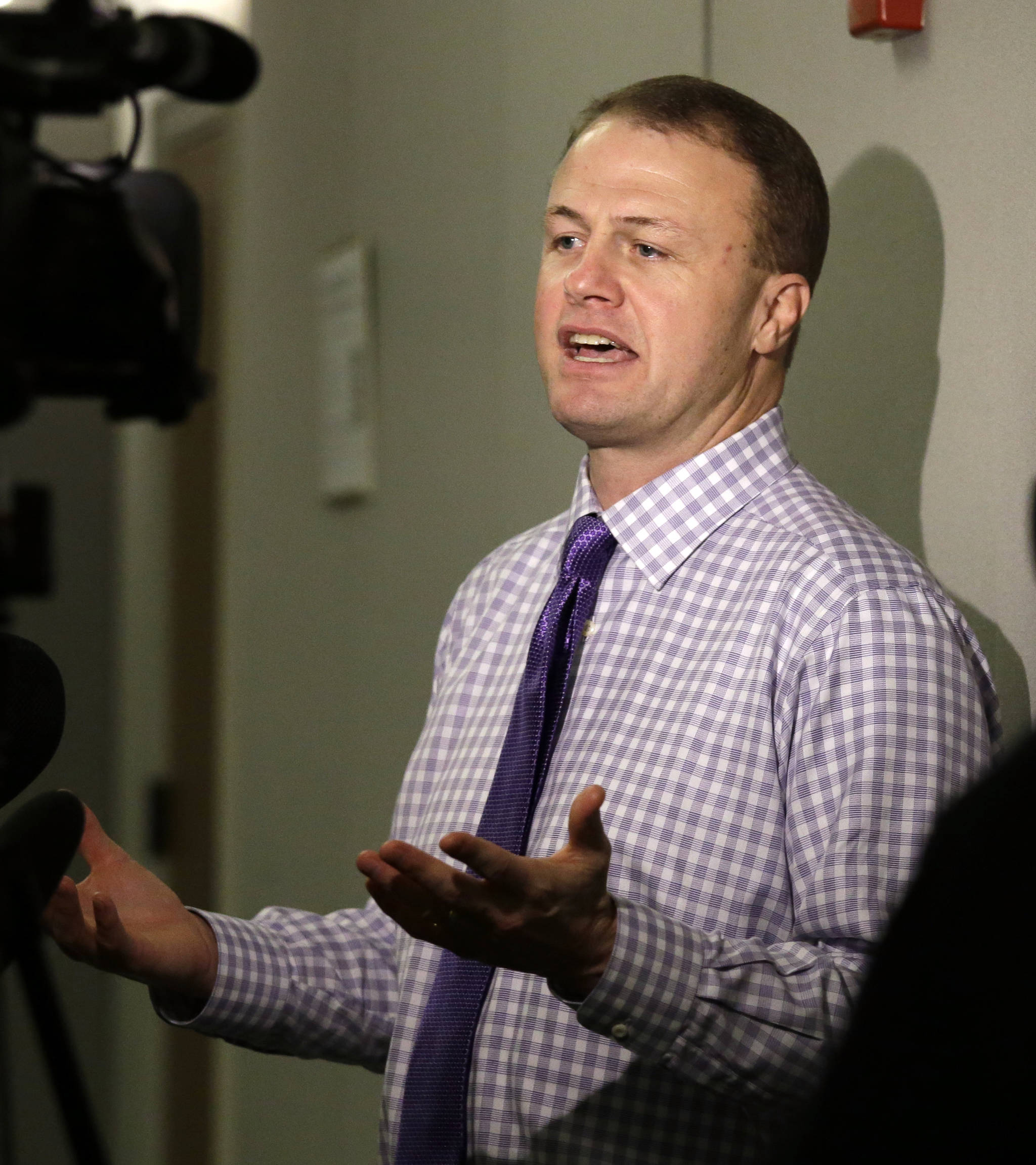 In this Jan. 21, 2016, photo, Tim Eyman speaks with reporters after hearing that a judge struck down his latest tax-limiting measure in Olympia. (Elaine Thompson/The Associated Press)