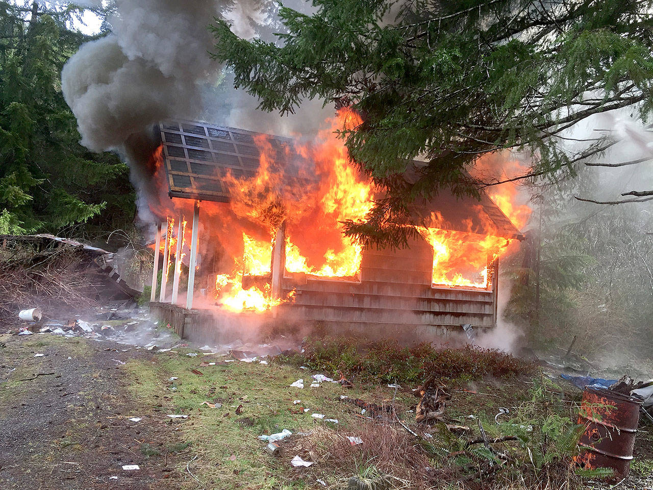 Sandy Floe’s house was consumed by flames in a permitted, controlled burn. (Bill Paul/Clallam County Fire District No. 1)