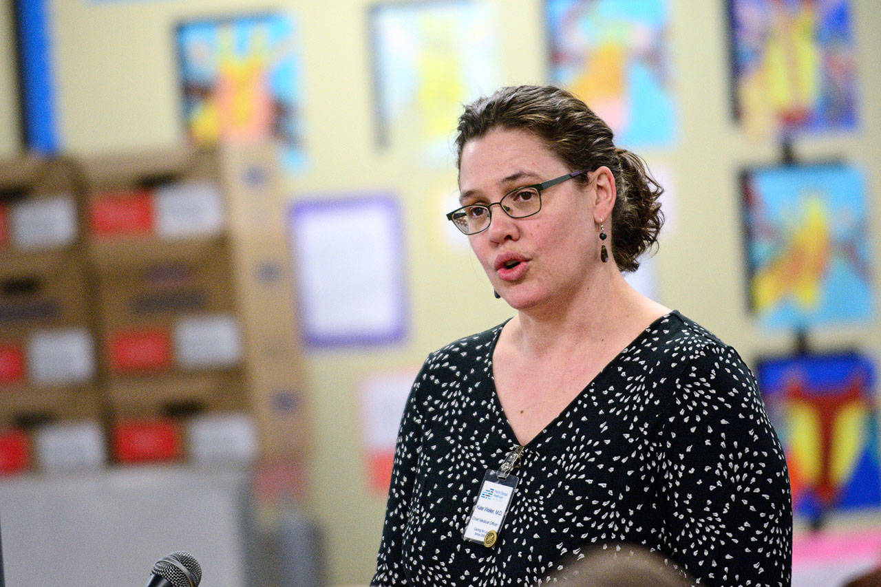 North Olympic Heatlhcare Network Chief Medical Officer Dr. Katrina Weller talks about the proposed health center at Port Angeles High School during a Port Angeles School District board meeting Thursday. (Jesse Major/Peninsula Daily News)