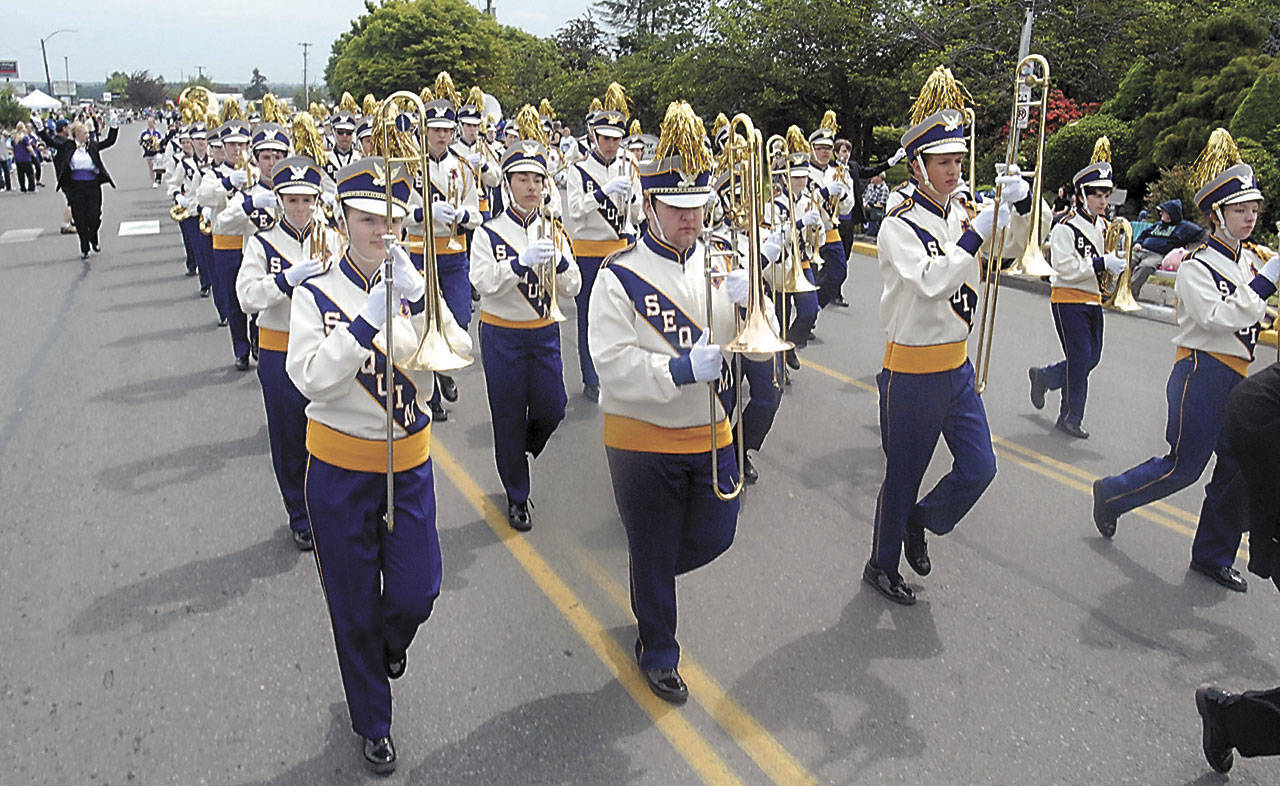 The Sequim High School Marching Band makes its way down the parade route during last year’s Irrigation Festival Grand Parade. (Keith Thorpe/Peninsula Daily News)