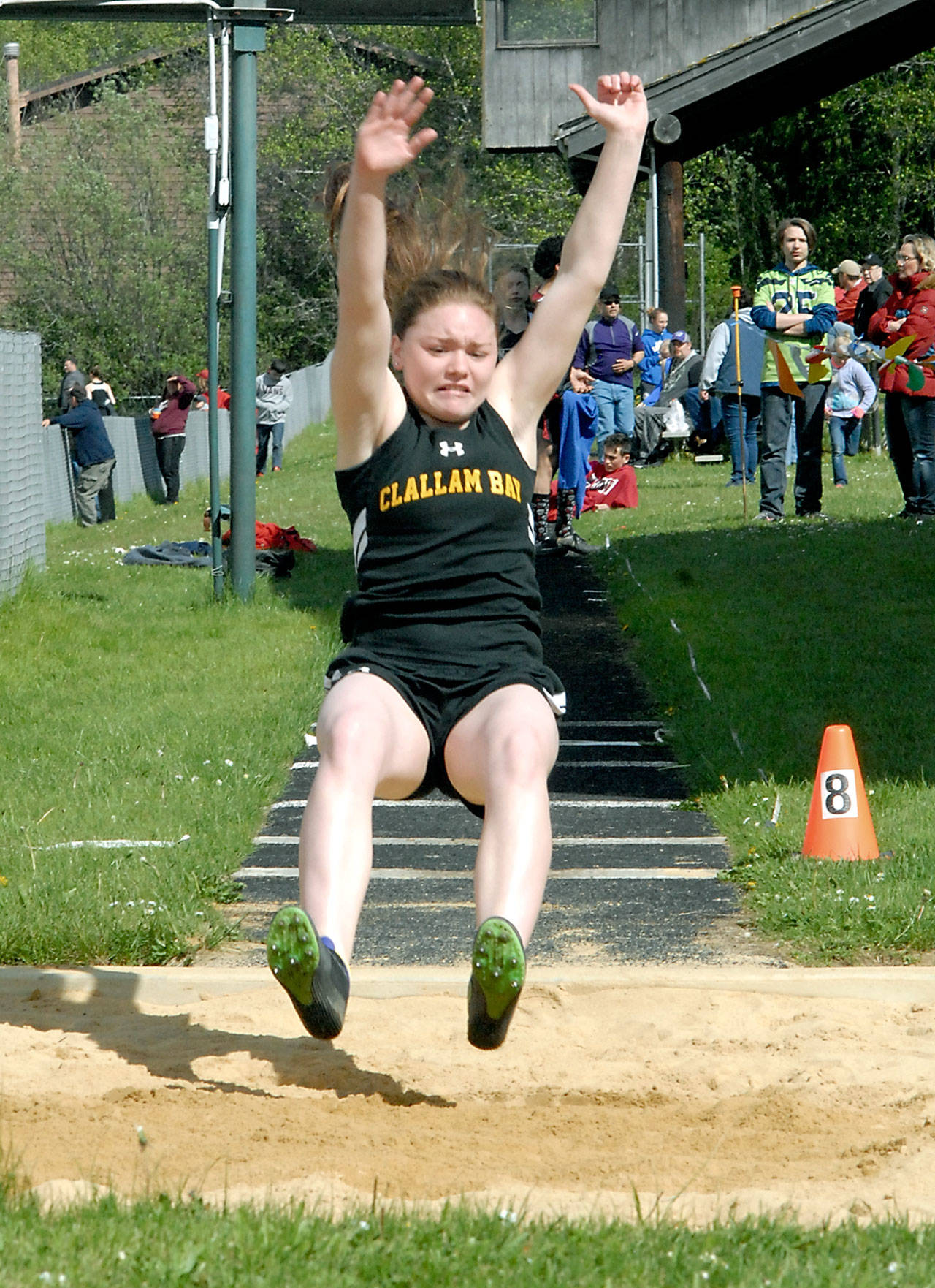 Keith Thorpe/Peninsula Daily News                                Hannah Olson of Clallam Bay competes in the long jump during the North Olympic League Sub District Meet at Crescent High School in Joyce.
