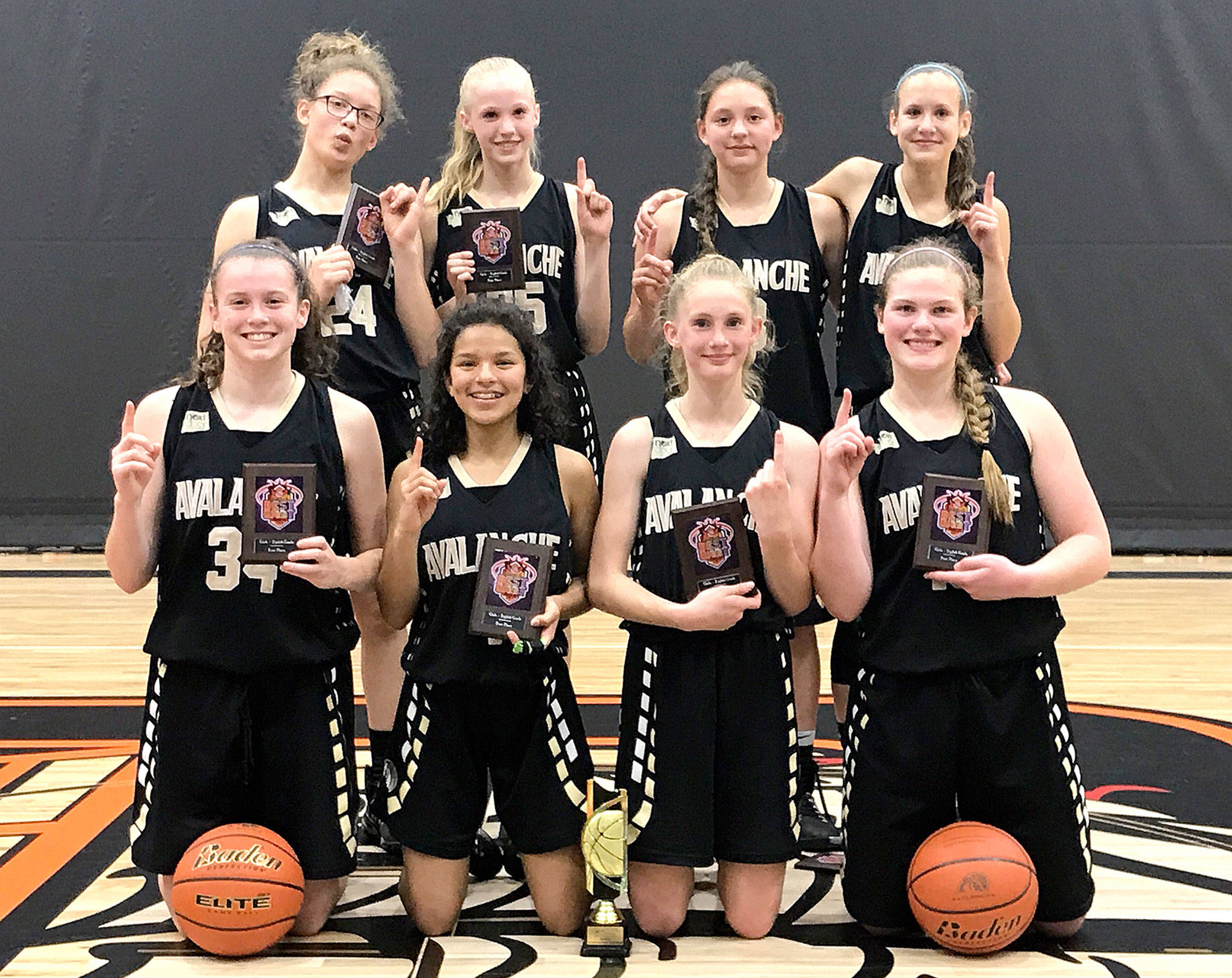The Next Door Gastropub Olympic Avalanche Black celebrate winning the prestigious Best in the West tournament in Yakima this weekend, featuring some of the top AAU girls’ teams from around the Pacific Northwest. The Avalanche won seven straight games at the tourney. From left back row, are Madison Cooke, Maggie Ruddell, Jada Cargo-Acosta and Hannah Reetz. From left, front row, Jaida Wood, Camille Stensgard, Emilia Long and Myra Walker.