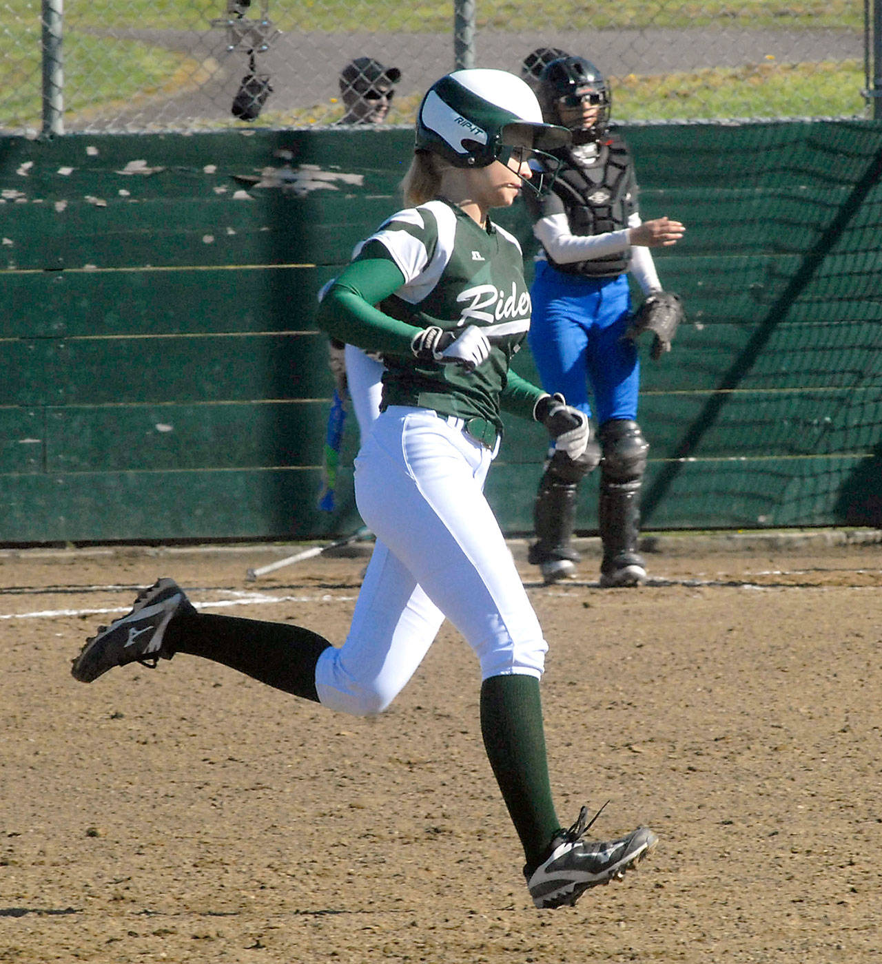 Keith Thorpe/Peninsula Daily News                                Port Angeles’ Natalie Steinman rounds the bases after homering in a game against Olympic on April 21.