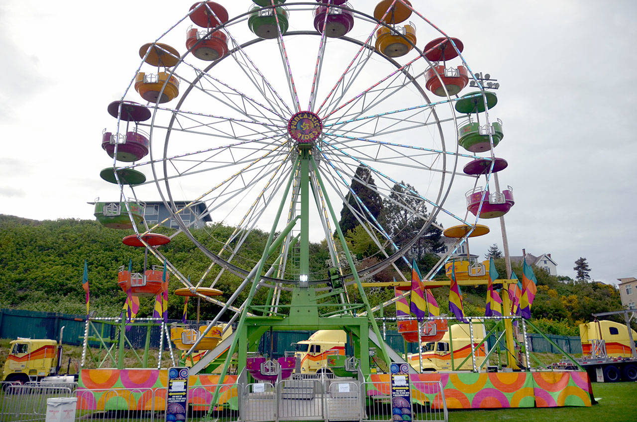 Three people were injured after falling from the Ferris wheel at the Port Townsend Rhododendron Festival on Thursday. (Cydney McFarland/Peninsula Daily News)