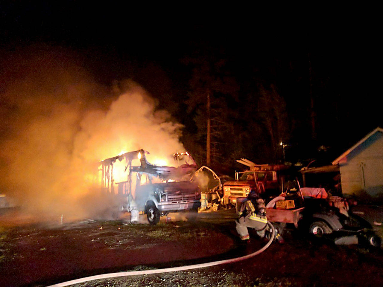 A trailer burns on the 600 block of O’Brien Road in Sequim late Tuesday night. (Clallam County Fire District No. 3) ​