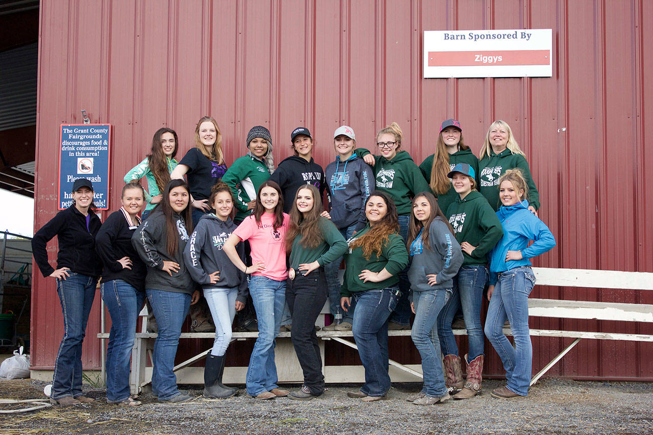 Port Angeles’ and Sequim’s high school equestrian teams competed at the state championship in Moses Lake earlier this month. The teams are, from left in front row, Sequim coach Katie Salmon-Newton, Amy Tucker of Sequim, Lilly Thomas of Sequim, Grace Niemeyer of Sequim, Sydney Balkan of Sequim, Kaytee Gibeau, of Port Angeles, Christine Hanson of Port Angeles, Miranda Williams of Sequim, Abby Hjelmeseth of Port Angeles and Cristina Williams of Sequim; from left in back, Emma Albright of Port Angeles, Emelie Fürste of Sequim, Ebony Billings of Port Angeles, Yana Hoesel of Sequim, Emily Gear of Port Angeles, Lise Hanson of Port Angeles, Cassie Moore of Port Angeles and Port Angeles coach Tina VanAusdle. (Brian Albright)