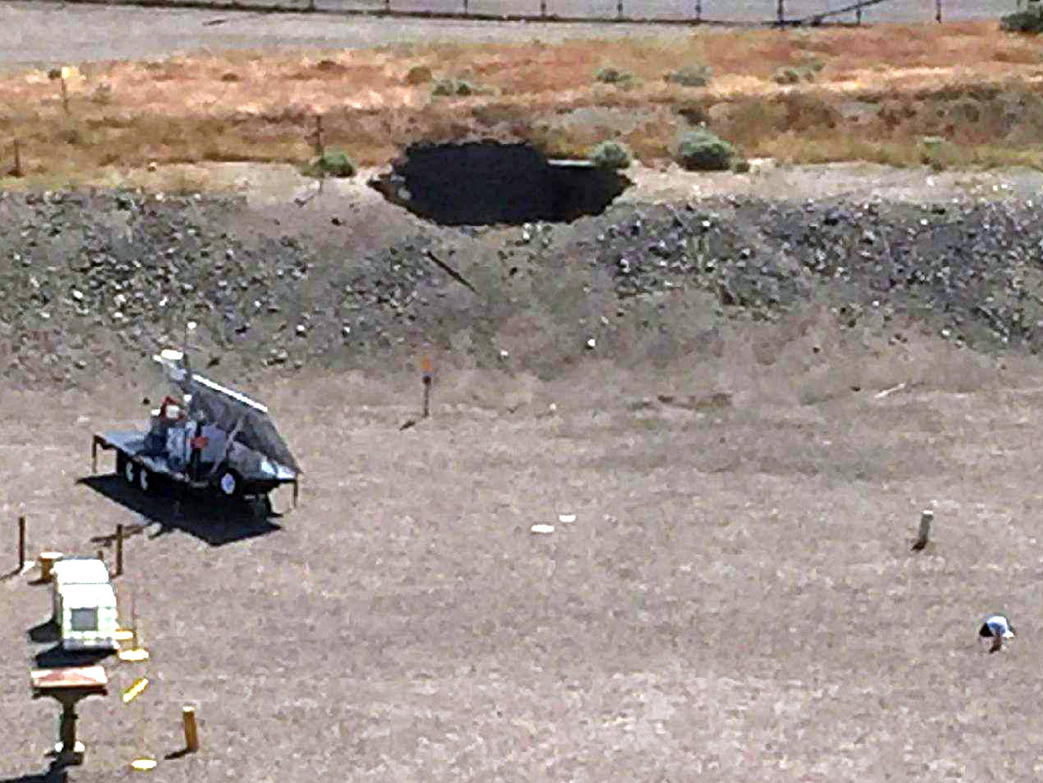 This image provided by the U.S. Department of Energy shows a 20-foot-by-20-foot hole in the roof of a storage tunnel at the Hanford Nuclear Reservation near Richland on Tuesday. (U.S. Department of Energy via AP)