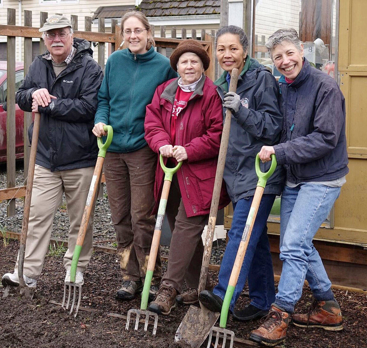 Veteran Master Gardeners Bob Cain, Laurel Moulton, Lois Bellamy, Audreen Williams and Jeanette Stehr-Green, from left, will lead a walk through the Fifth Street Community Garden this Saturday.