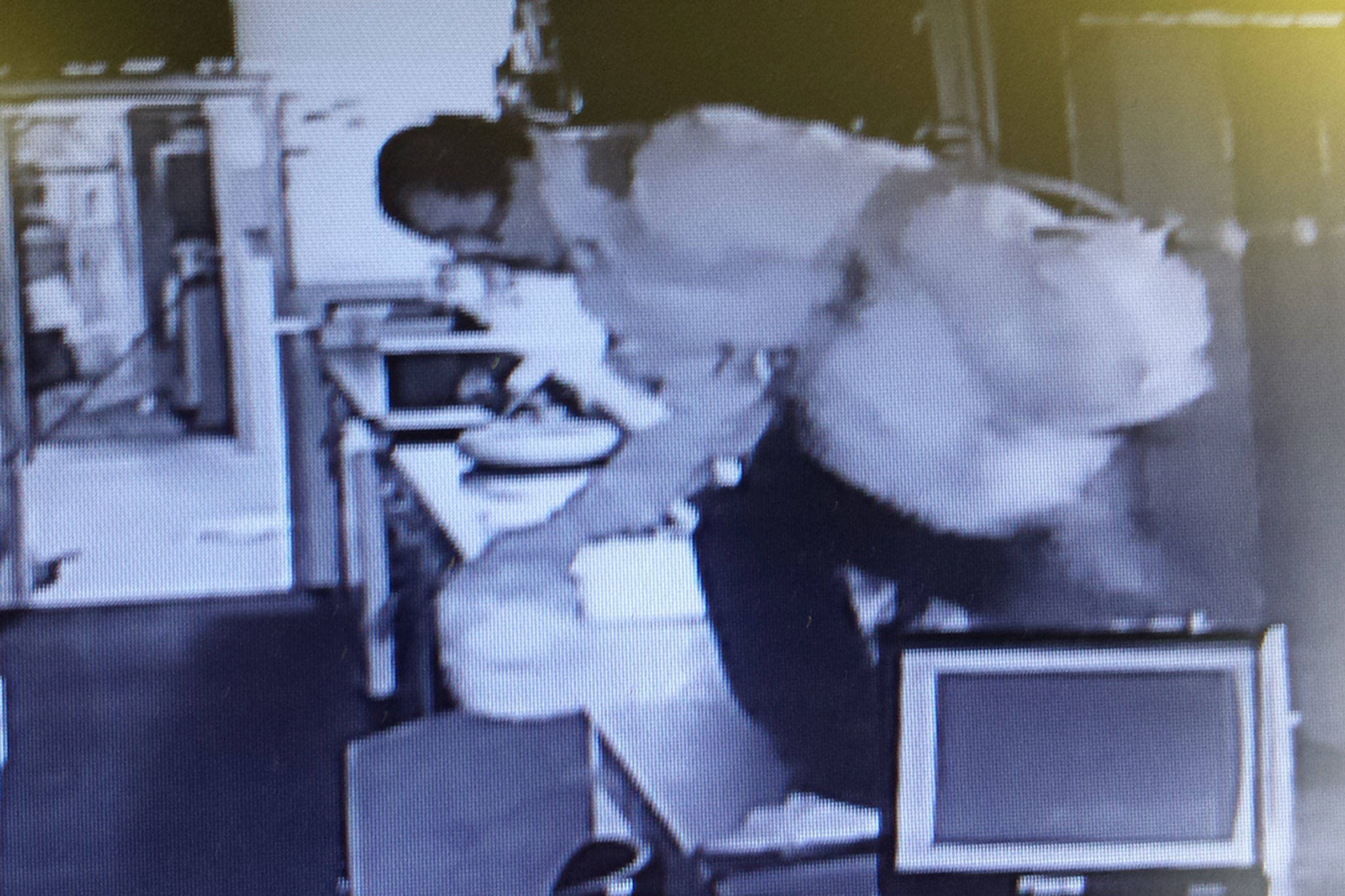 Sequim police officers are seeking a man caught on video at the Sequim VFW post during a burglary Sunday. (Sequim VFW)