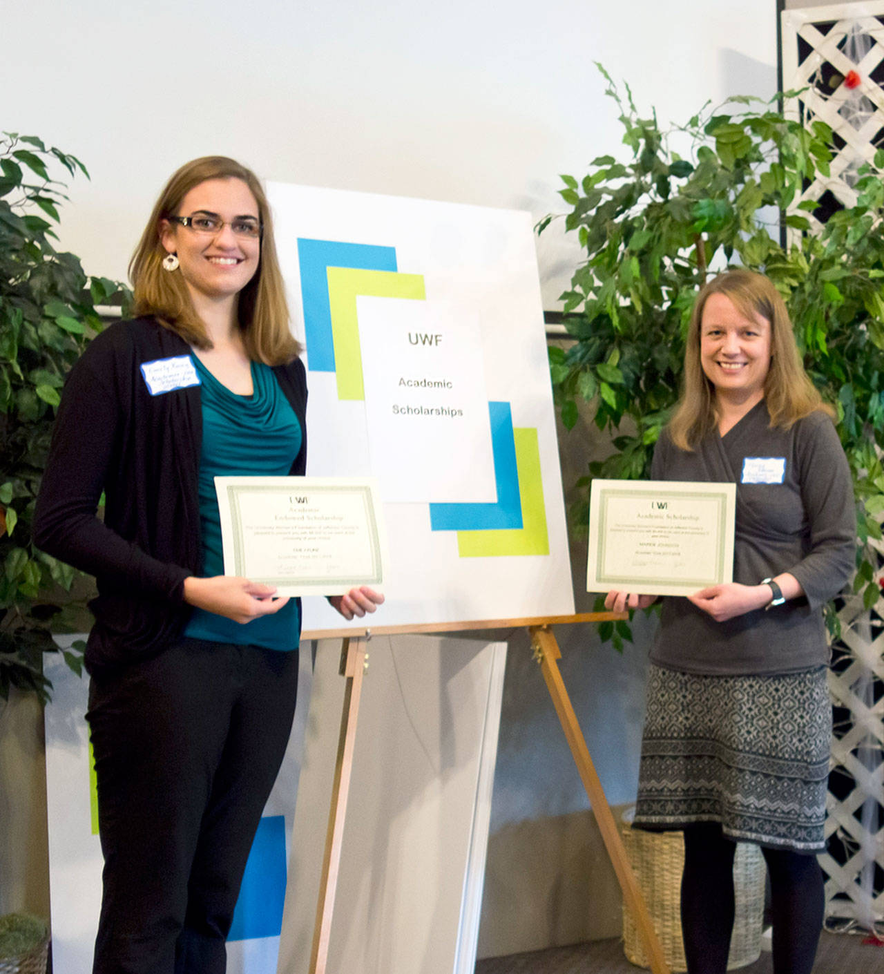 Scholarship winners Emily Kunz, left, and Maren Johnson were among 32 young women recognized during the May meeting of the Association of American University Women of Port Townsend and its affiliate, the University Women’s Foundation of Jefferson County.