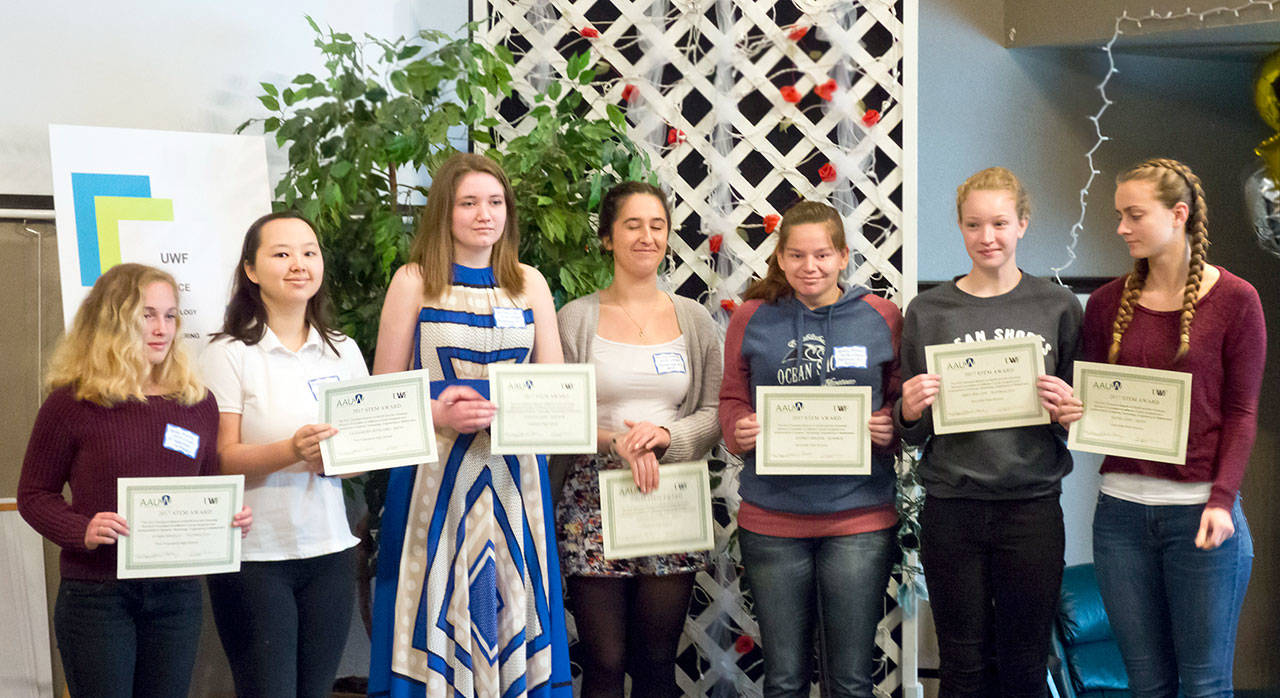 High school STEM award winners are, from left, Kyama Bradley, Cassandra Rowland, Kaitlyn Ejde, Miriam Molotsky, Sydney Brown, Abby Weller and Katrina Love. Not pictured are Helena Stafford and Renee Woods.