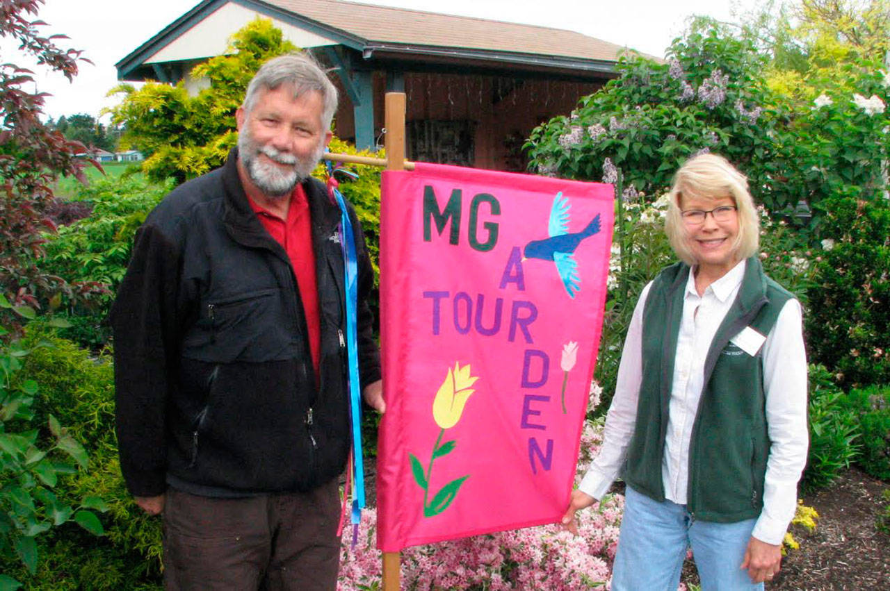 Petals & Pathways Garden Tour garden coordinator Mike Barnes, left, and Chair Karen Mahalick recently announced that tickets for the June 24 home garden tour are on sale.
