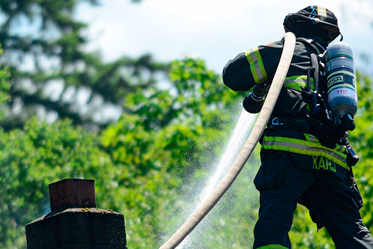 Firefighter tackle roof fire in Port Angeles