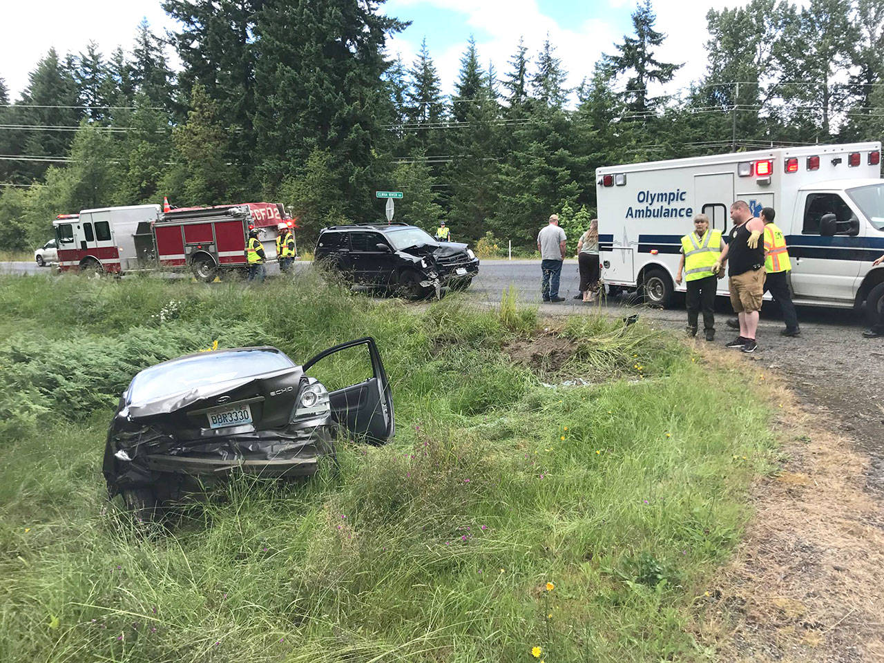 Port Angeles Police Department off-duty officers are credited with helping the victims of a Sunday afternoon collision on Highway 112. (Port Angeles Police Department)