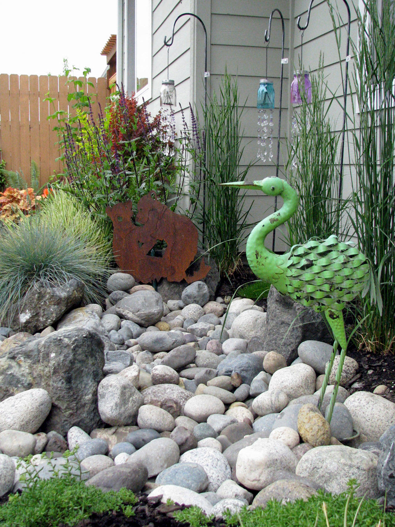 Dry streambeds, small ponds and other water features along with cistern and drip irrigation systems will be exhibited on the Petals & Pathways Home Garden Tour sponsored by the Master Gardener Foundation of Clallam County on Saturday in Sequim.