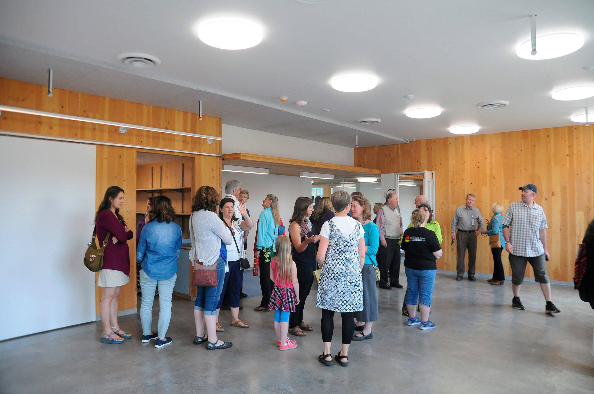 Attendees of a ribbon-cutting at Greywolf Elementary School get a first look inside the school’s new building built using cross-laminated timber. (Michael Dashiell/Olympic Peninsula News Group)