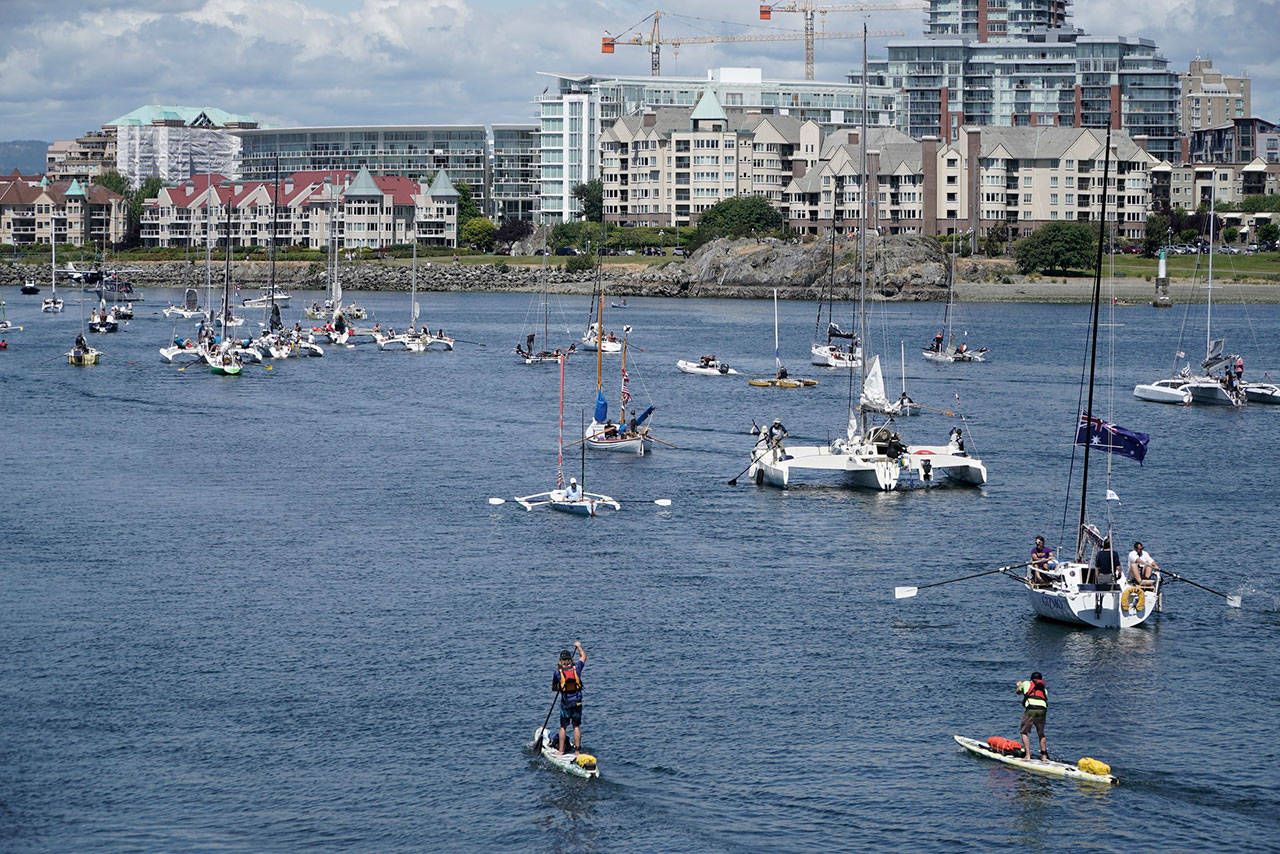 Many of the 45 watercraft in this year’s Race to Alaska depart Victoria’s Inner Harbour to continue the race Sunday. (Steve Mullensky/for Peninsula Daily News)