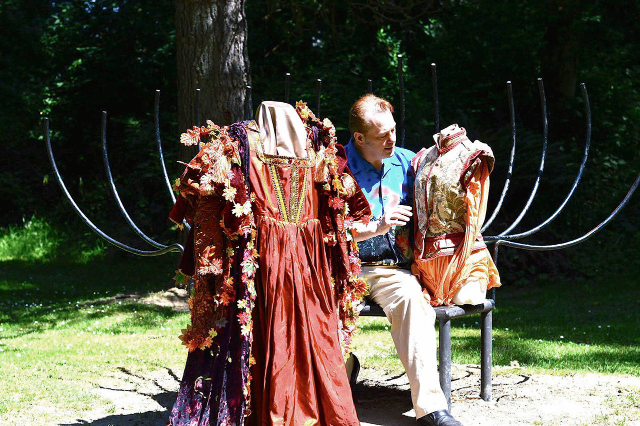 Diane Urbani de La Paz/for Peninsula Daily News                                Curator Richard Stephens brings costumes for Titania, of Shakespeare’s “A Midsummer Night’s Dream,” and an Italian youth to “Clothes Oft Proclaim the Man: Fashion and Passion in the Time of Shakespeare,” at the Port Angeles Fine Arts Center starting Saturday.