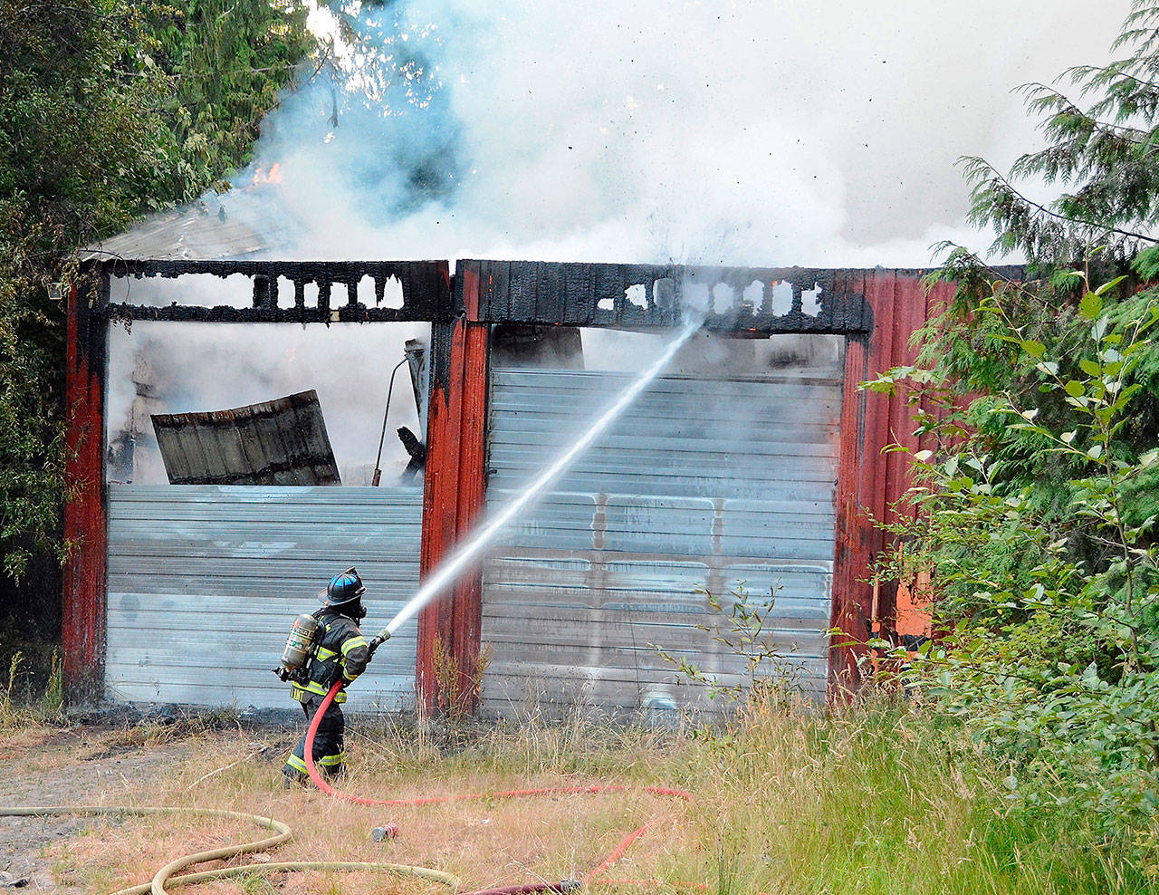 Clallam Fire District No. 2 responded to a structure fire at 243532 U.S. Highway 101 on Wednesday morning. (Jay R. Cline/Clallam Fire District No. 2)