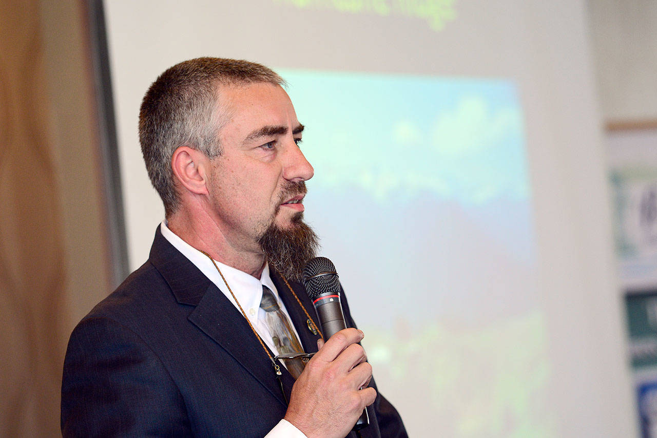 John Goar, a volunteer who has offered free telescope viewing at Hurricane Ridge throughout the past eight summers, told those who attended the Port Angeles Regional Chamber of Commerce luncheon Wednesday that light pollution from Port Angeles is getting worse. (Jesse Major/Peninsula Daily News)