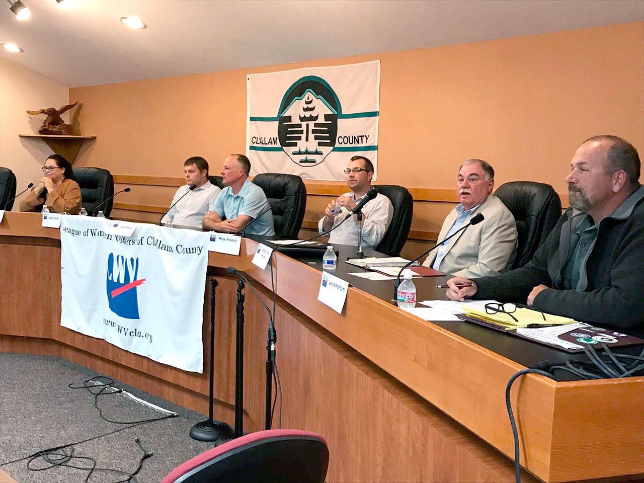 From left, Port Angeles City Council candidates Marolee Smith, Jacob Oppelt, Todd Negus, Mike French, Jim Moran and Lee Whetham answer questions at a voters forum. (Paul Gottlieb/Peninsula Daily News)